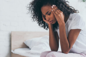 Black woman suffering infertility.