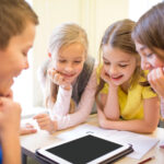 Kids watching classmate get adopted on Zoom