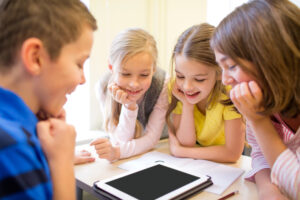 Kids watching classmate get adopted on Zoom