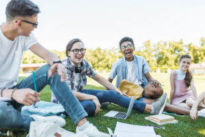 Adolescents enjoying school outside