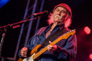 Dave Crosby playing guitar