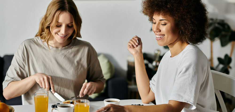 Female couple eating breakfast