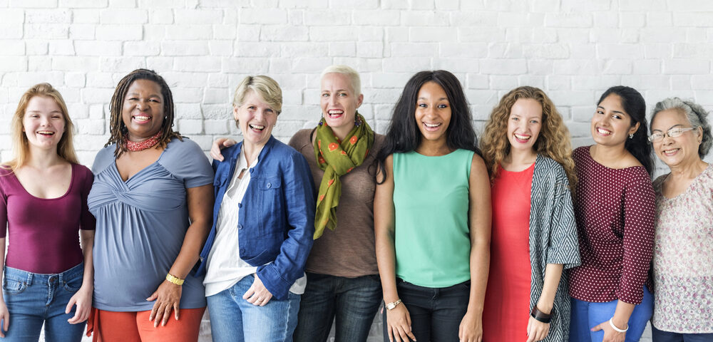 Woman gathered together sharing IVF experiences