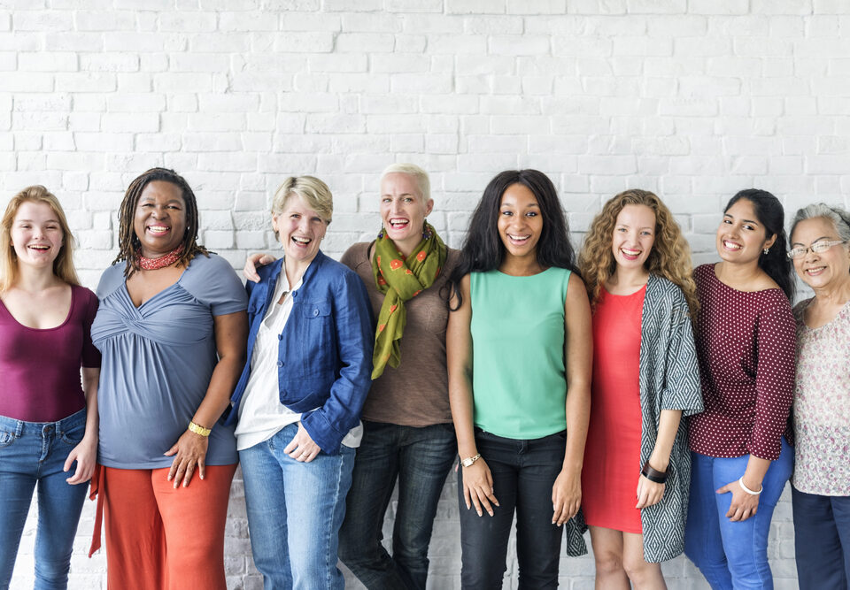 Woman gathered together sharing IVF experiences