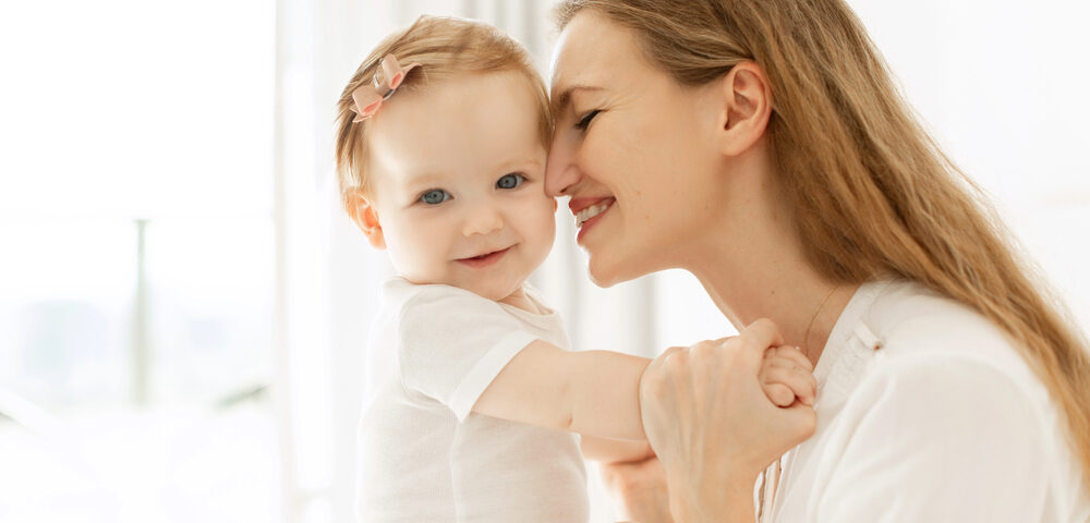 Woman with baby born via IVF