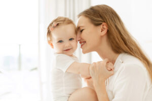 Woman with baby born via IVF