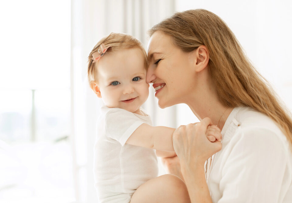 Woman with baby born via IVF