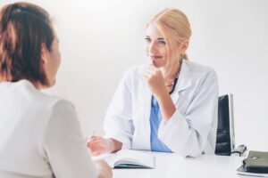 Woman talking to doctor about IVF