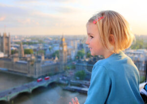 Child looking over London from the London Eye