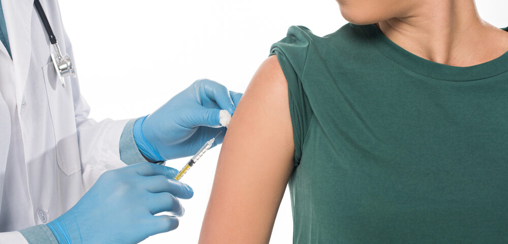 Woman getting COVID-19 vaccine