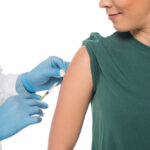 Woman getting COVID-19 vaccine