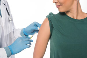 Woman getting COVID-19 vaccine