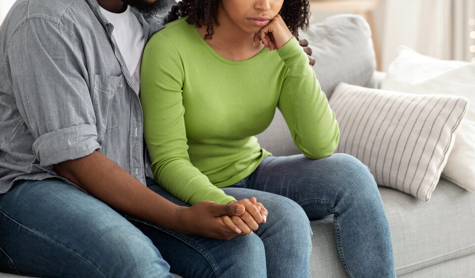 Sad couple after miscarriage